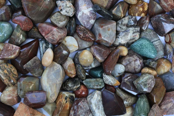 The background of multi-colored shiny stones