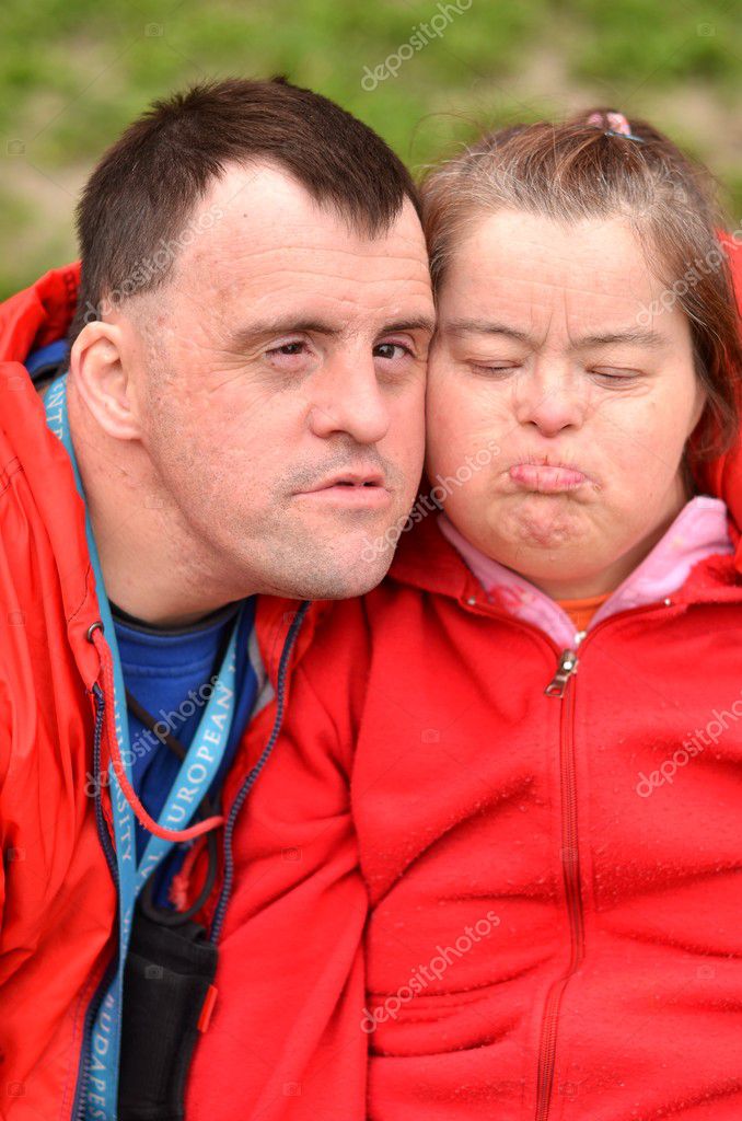 http://static8.depositphotos.com/1211672/1019/i/950/depositphotos_10197276-Couple-with-Down-Syndrome.jpg