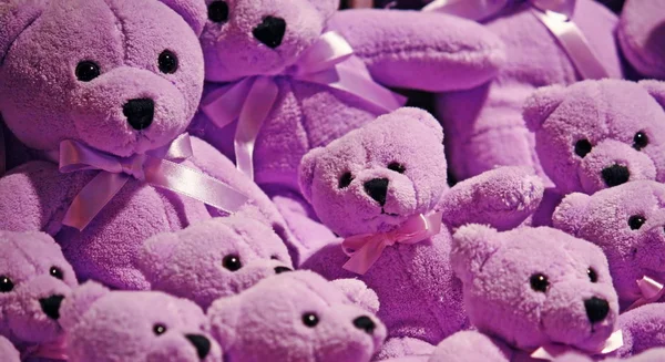 Purple stuffed teddy bear for children to play