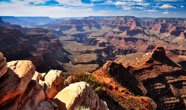 Grand canyon landscape view with rocks in foreground