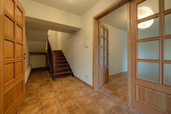Wood doors and stairs in new home — Stock Photo #8754432
