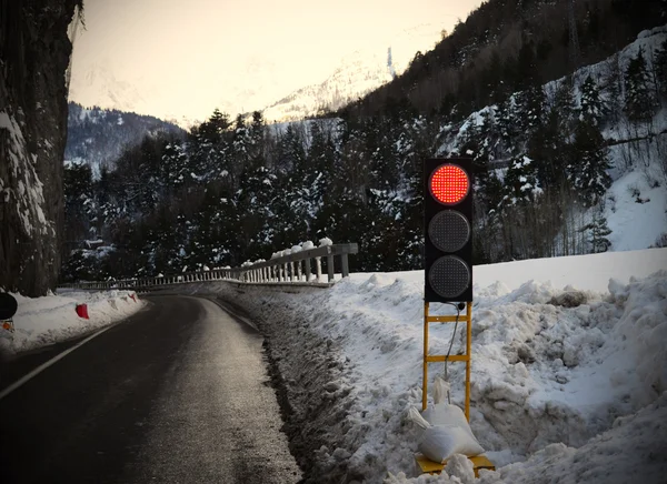 Red traffic light for snow or bad weather