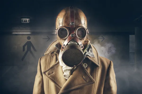 Grunge portrait man in gas mask