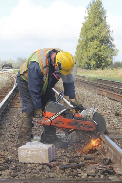 Crew Cutting Railway Track
