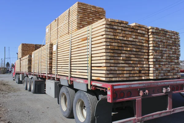 Rear View of a Large Lumber Hauling Truck
