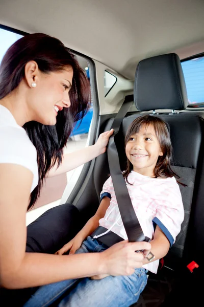 Fastening seat belt in a car