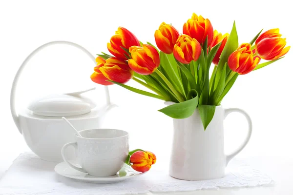 Red tulips and tea
