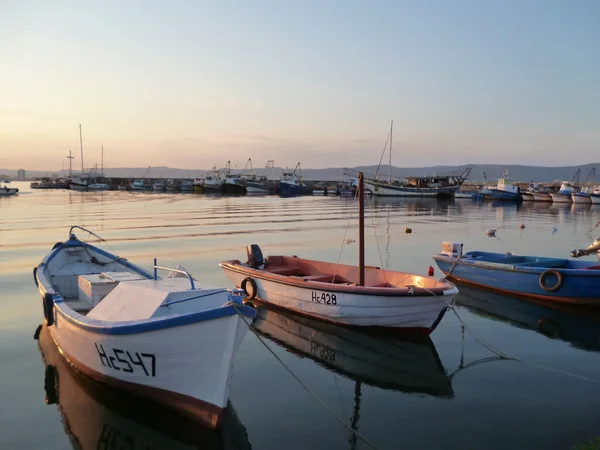 View of the bay and fishing boats at sunset. Bulgaria, Nessebar. — Stock Photo #8225272