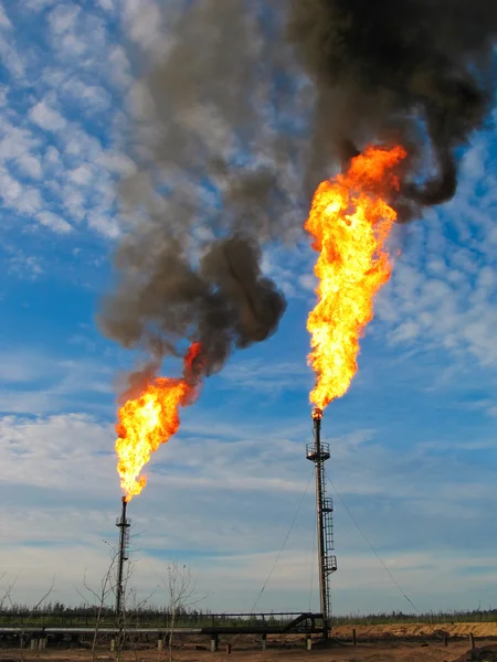 Burning oil gas flares