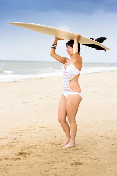 Girl Standing With Surfboard