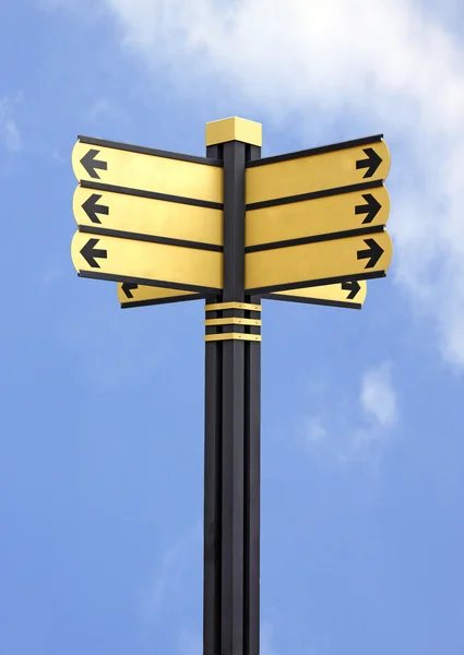 Street sign with 6 signs agaist blue sky