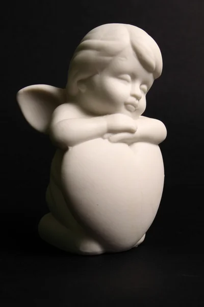 Cupid clay statue semi-profile