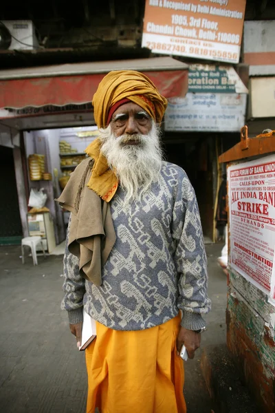 Old bearded man at market, delhi, india