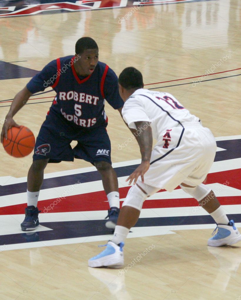  - depositphotos_8228030-Anthony-Myers-defended-by-Lamont-Jones-in-an-Arizona-Basketball-Game