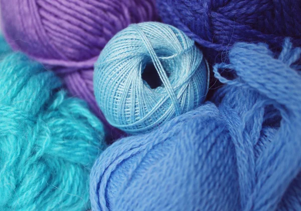 Set of balls of threads of dark blue shades