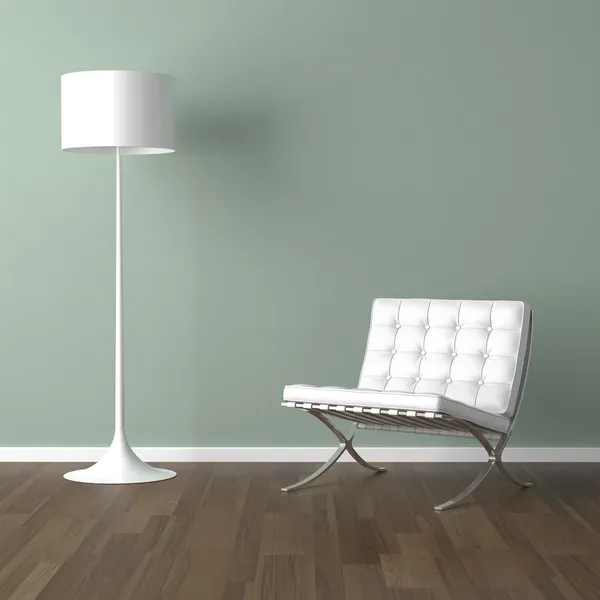 White barcelona chair and lamp on green