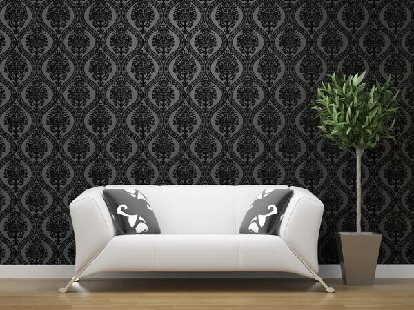 White sofa on black and silver wallpaper