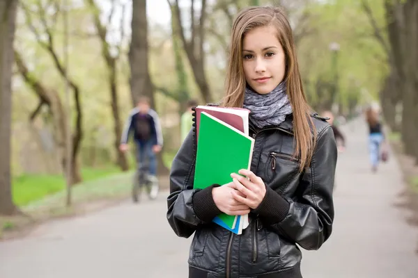 Cool fashionable young student girl outdoors. — Stock Photo #10384741