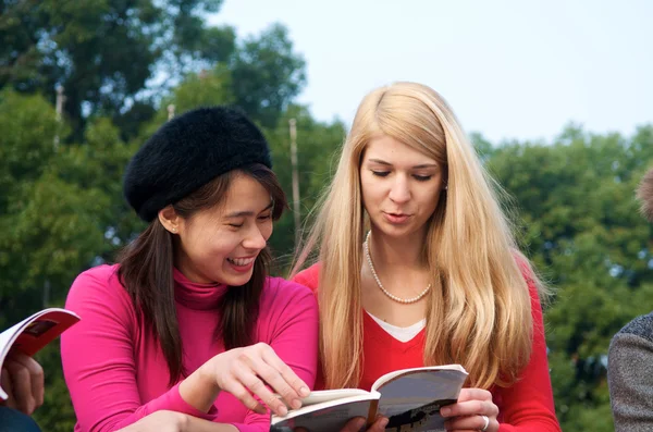 Multicultural girls studying in College