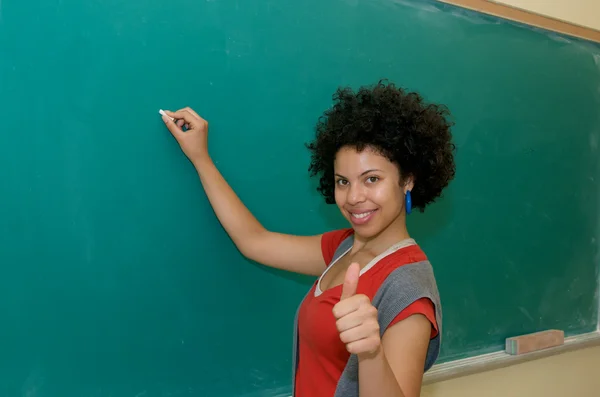 African American student thumbs up