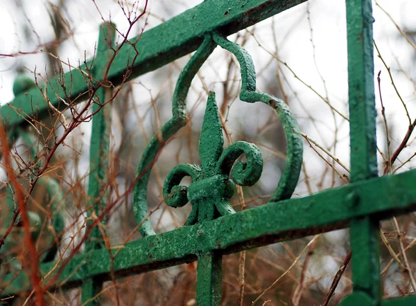 Green metallic fence in Trinity Sergius Lavra, Russia