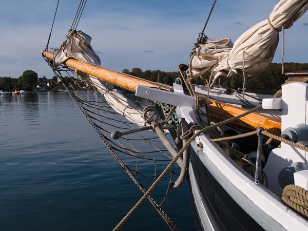 Traditional wood sailboat sailing