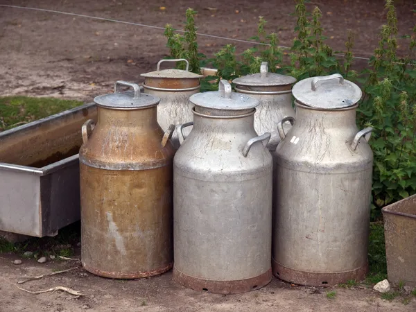Milk cans jugs in a farm