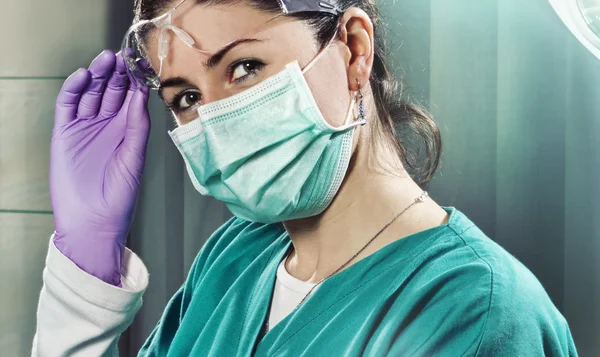 Female Surgeon in Operating Room