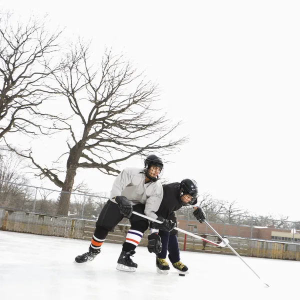 Boys playing winter sport. — Stock Photo #9224644