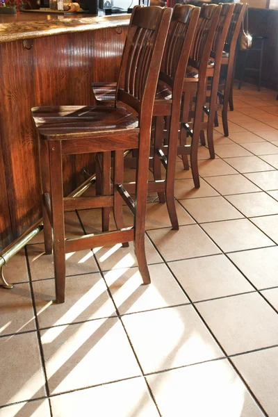 Bar stools at bar.