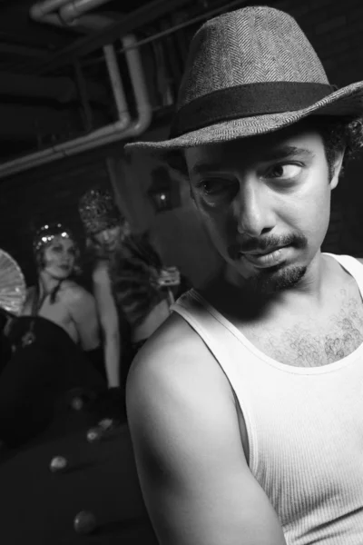 Man dressed like retro gangster. by iofoto - Стоковая фотография.