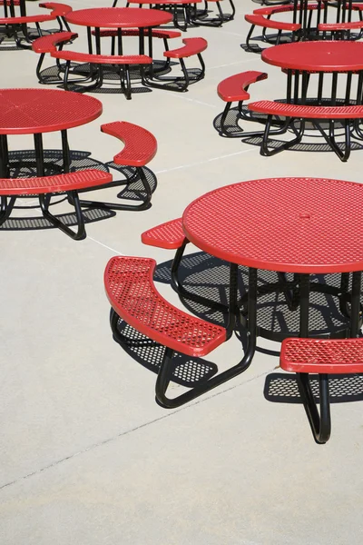 Red Circular Cafeteria Tables