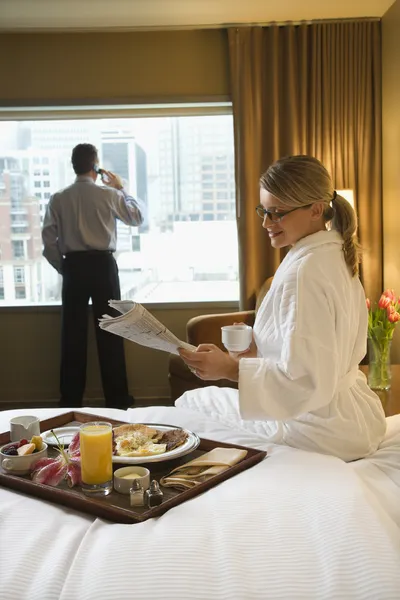 Woman and Man in Hotel Room