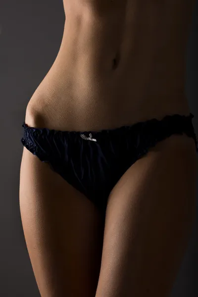 Beautiful healthy female body waist in underwear