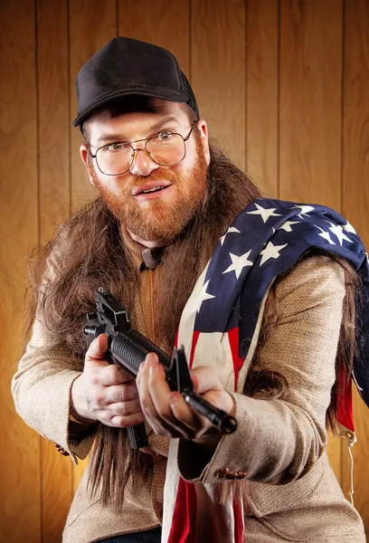 Southern Hick with a rifle and flowing hair flag