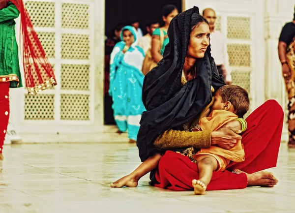 Indian woman with children