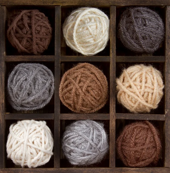 Assorted balls of yarn in a box