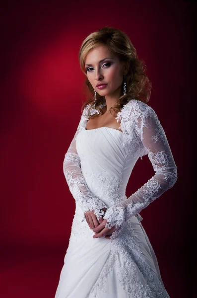 Fashion wedding model pretty bride in bridal dress studio shot
