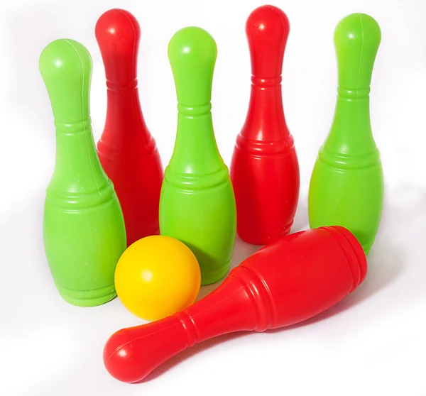 Kids bowling colorful skittles and ball — Stock Photo #8664250