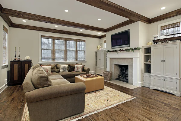 Family room with wood ceiling beams