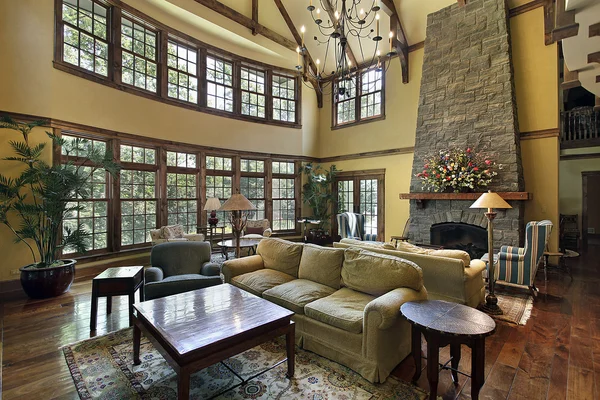Large family room with stone fireplace