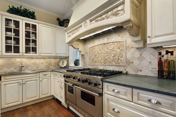 Kitchen with stove hood design