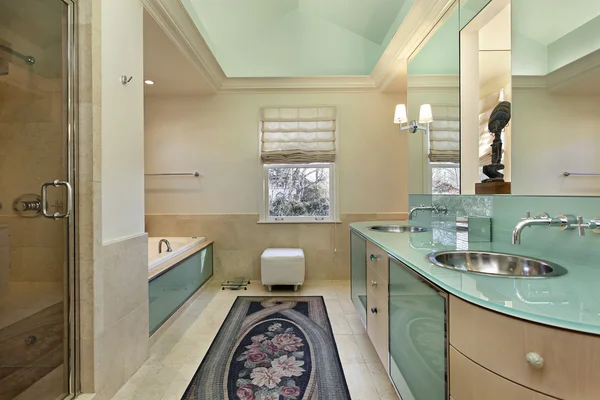 Master bath with lime green vanity