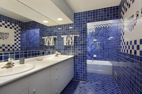 Bathroom with blue tile