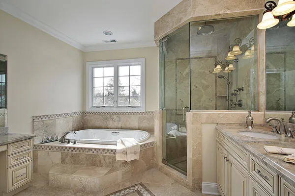 Master bath with large glass shower