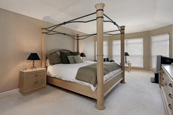 Master bedroom with oak wood bed frame