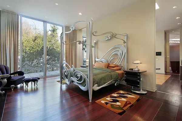 Master bedroom with sliding doors to patio