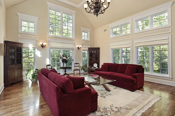 Living room with two story windows