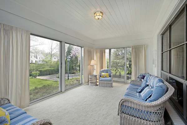 Sun room with patio view