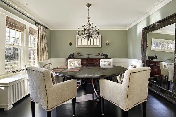 Dining room with olive walls